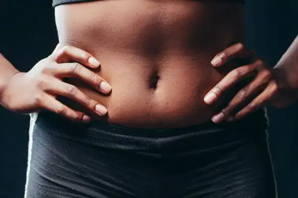 Toning Your Stomach: The Ultimate Guide to Achieving a Sculpted Stomach While Shedding Pounds 1 Image of a toned stomach after non surgical treatment Hertfordshire